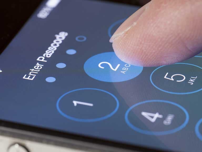 "Family using smartphones safely with mobile security apps and parental controls enabled."