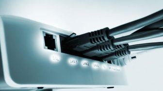 Australian business professionals reviewing online security measures on their office computers.