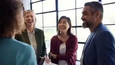 picture of happy business team having happy conversation