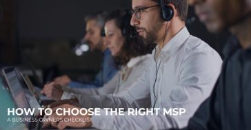 Business owner reviewing a checklist to select the right managed service provider (MSP)